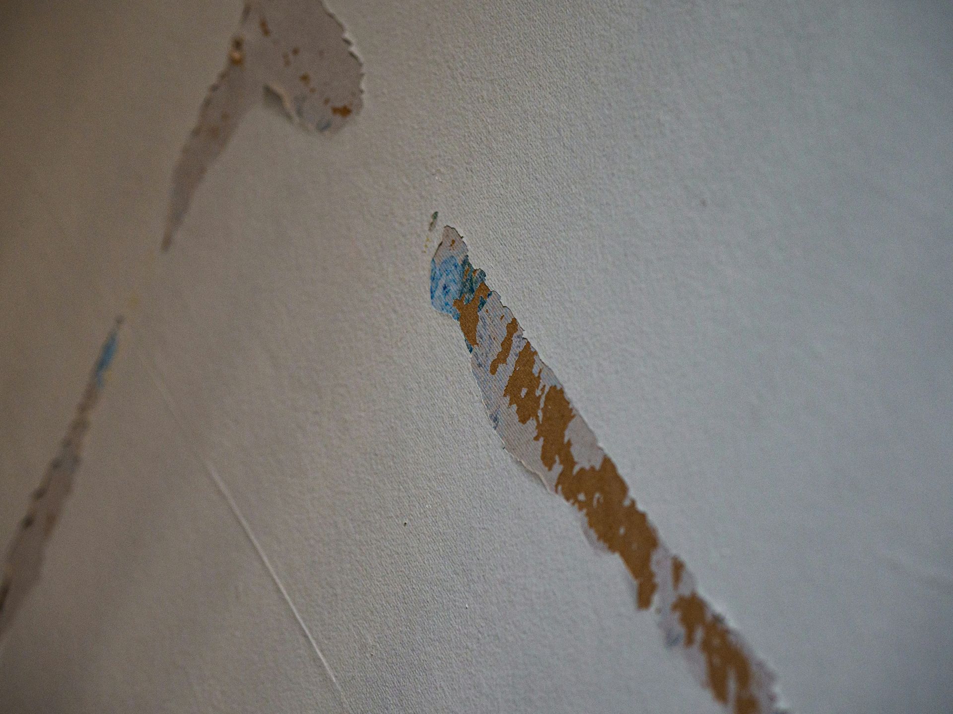white and brown painted wall